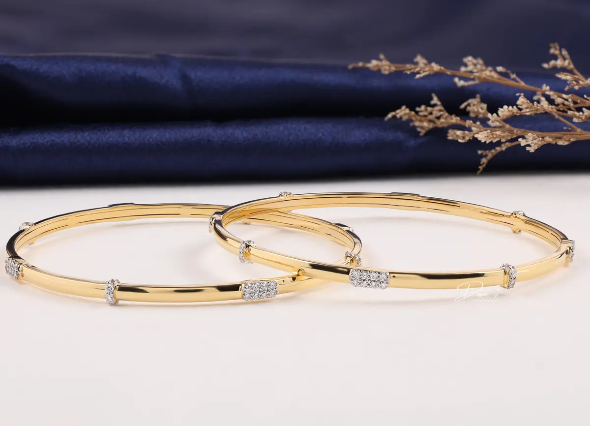 Gold and diamond bangles made by Desai Diamonds