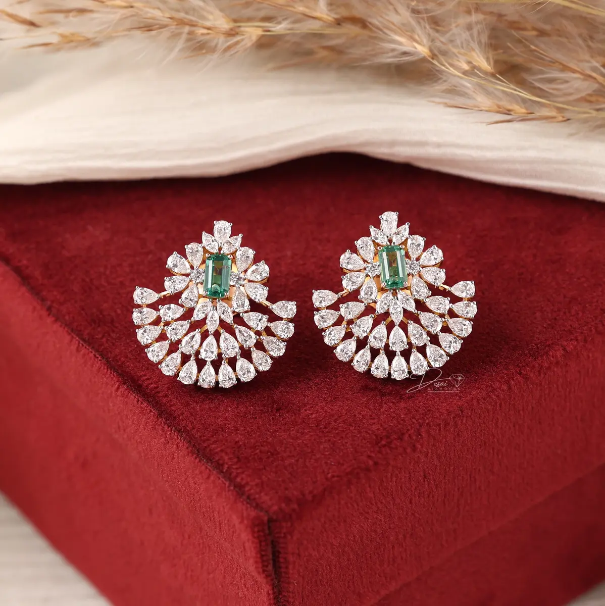 Emerald and diamond statement earrings made by Desai Diamonds